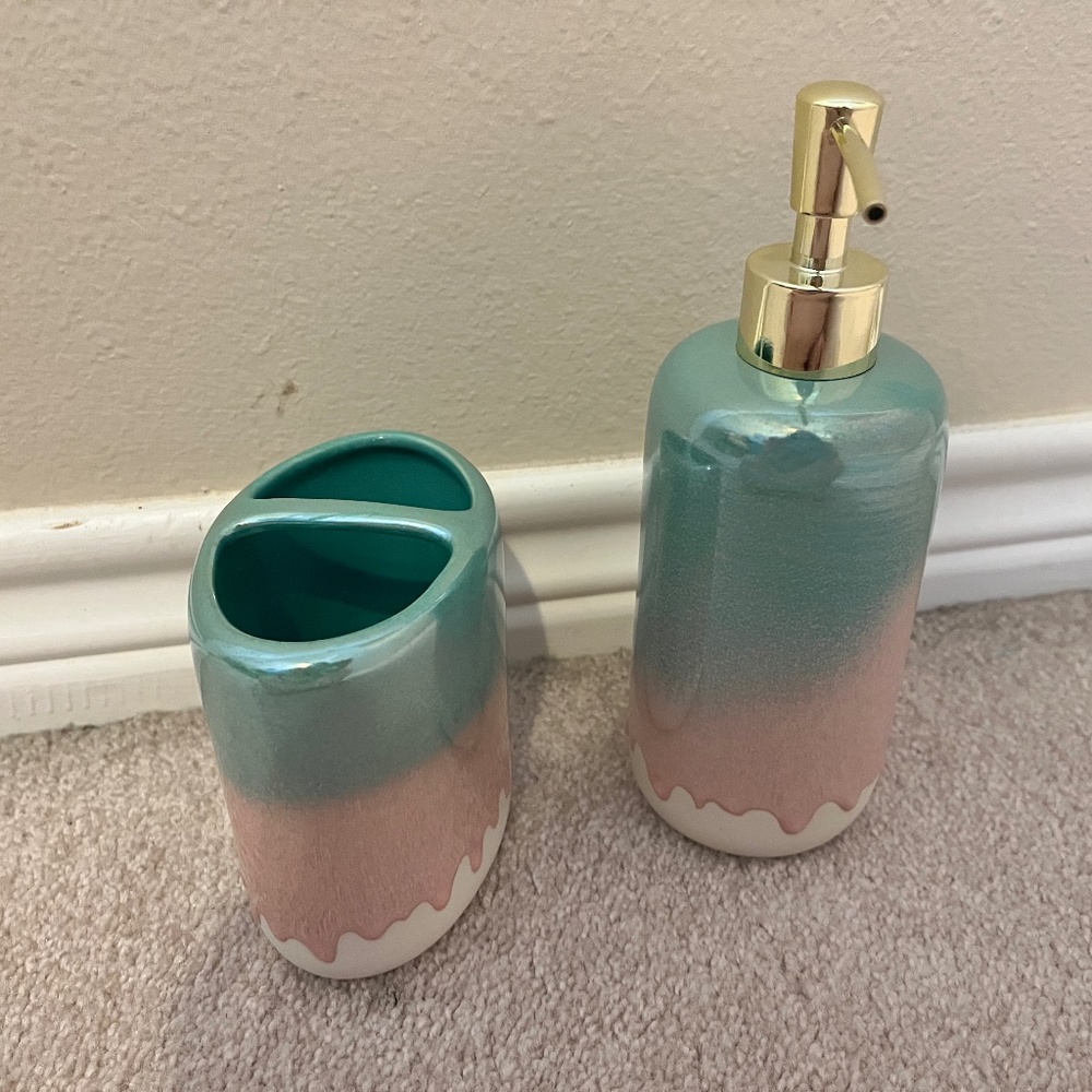 Matching Blue and Pink Toothbrush Holder and Soap Dispenser